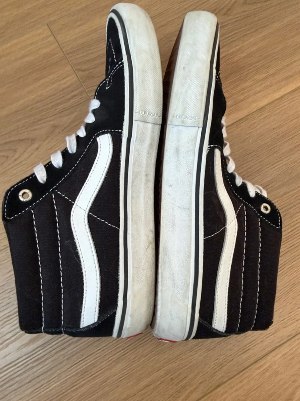Vans Black & White Mid-Top Skate Sneakers